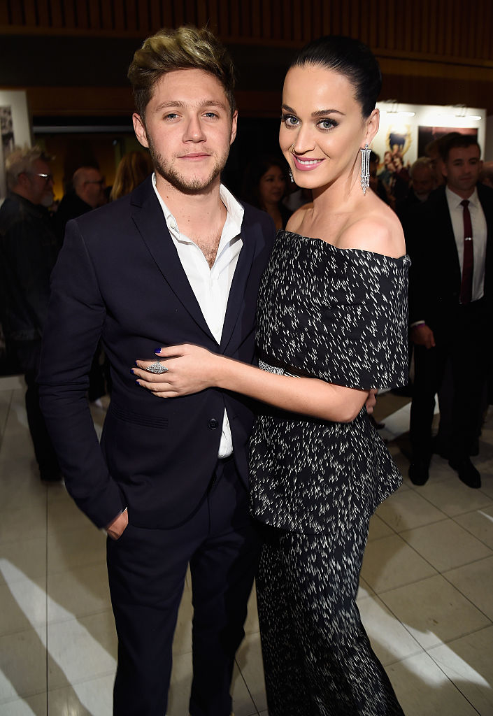 the two with their arms around each other during an event