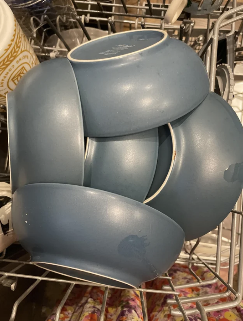 bowls badly loaded in a dishwasher