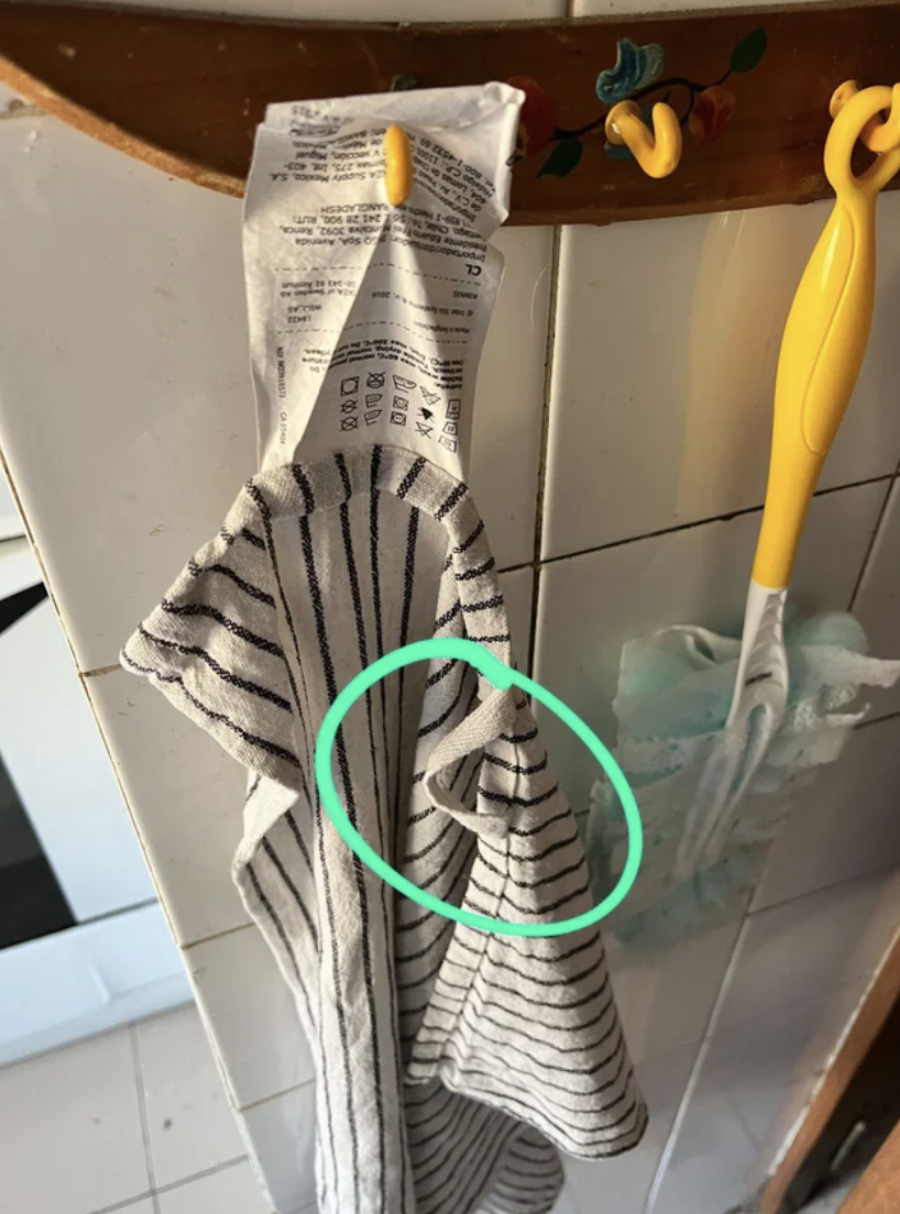 a towel badly hung on a hook