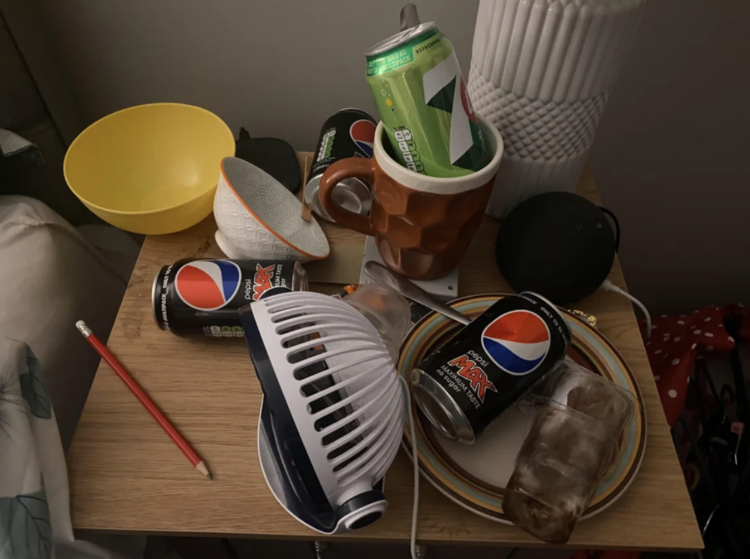 a messy bedside table