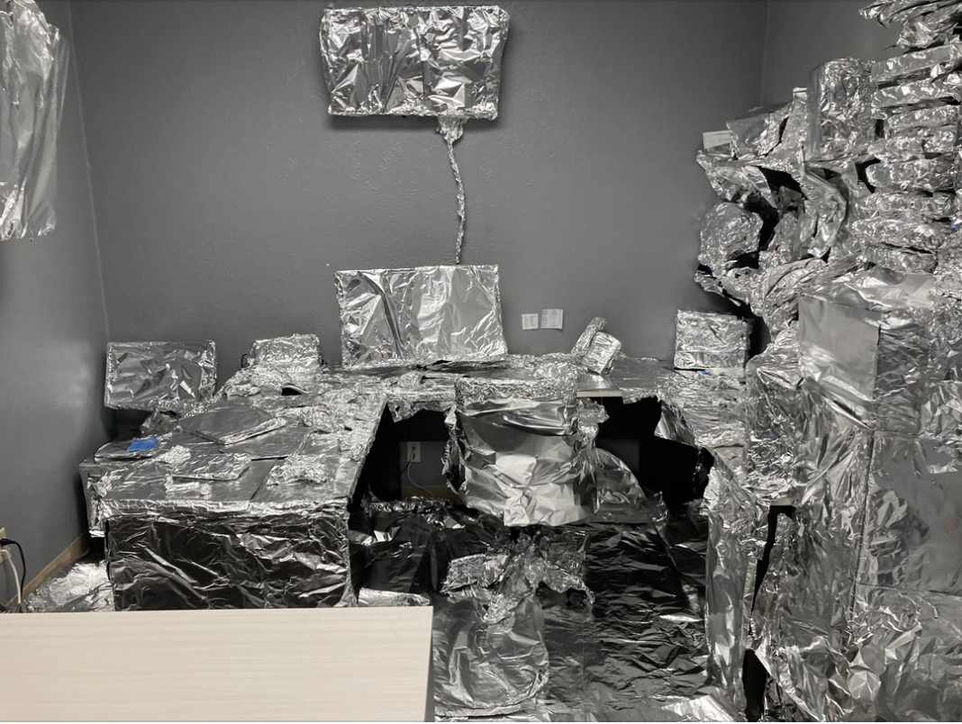 an office covered in tin foil