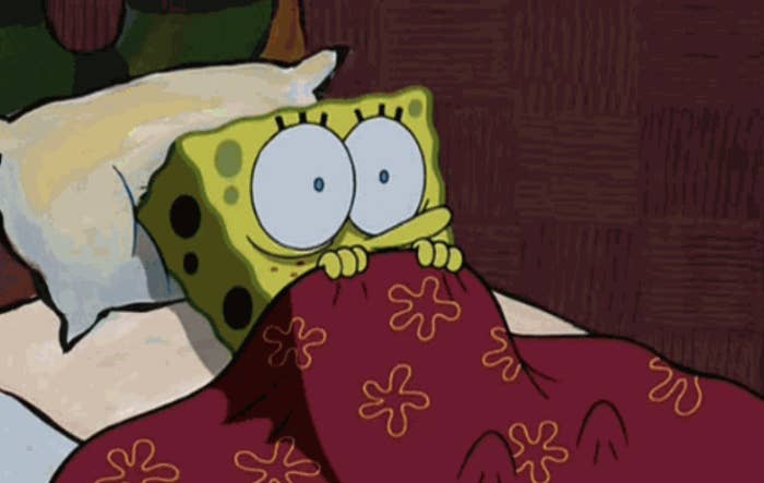 spongebob hiding under a blanket