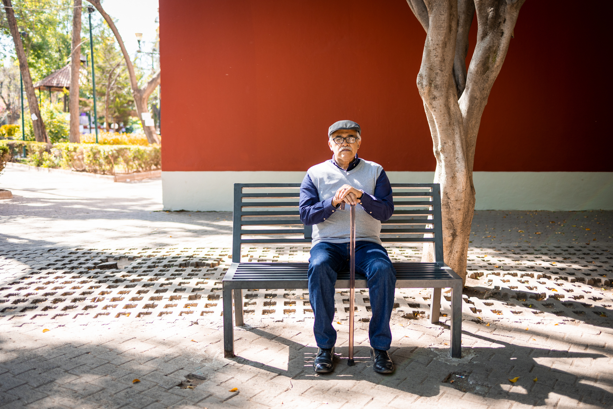 older man sitting on a bench
