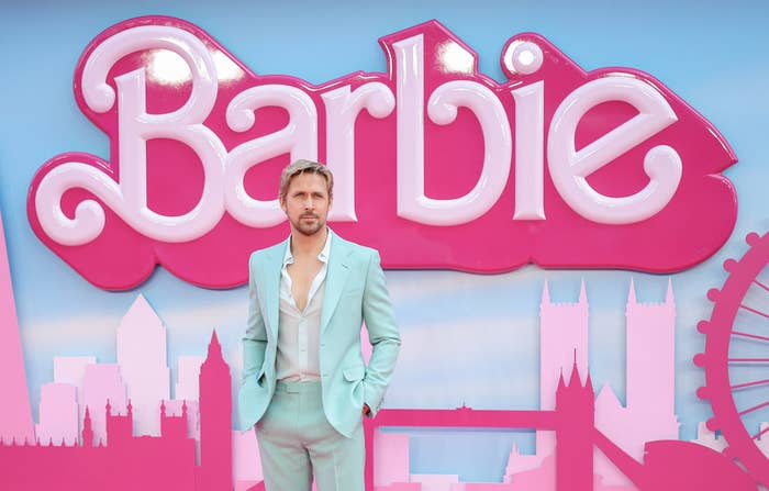 ryan at the movie premiere for barbie wearing a pastel suit