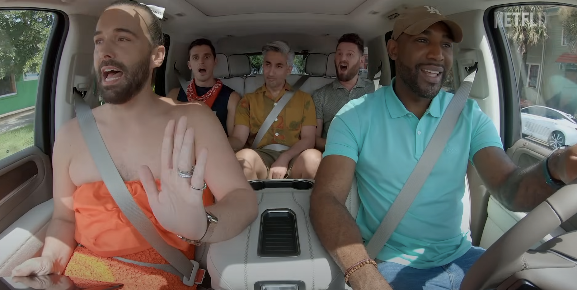 the 5 hosts in a car together