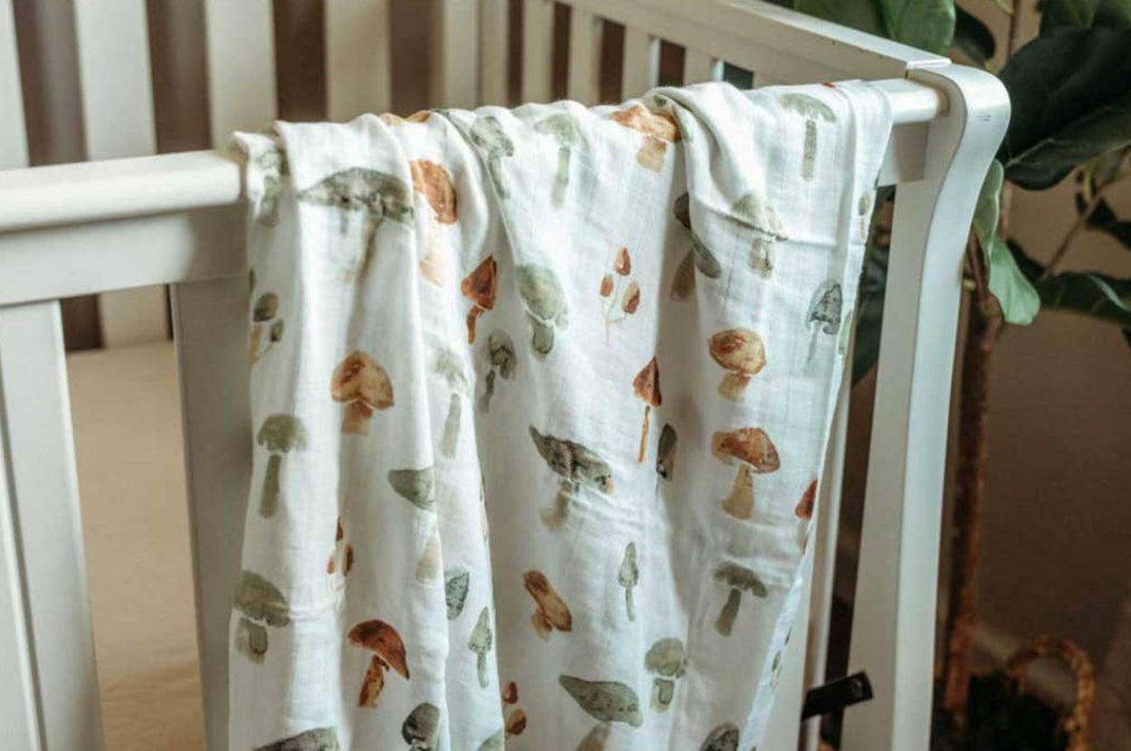 a mushroom print muslin baby blanket