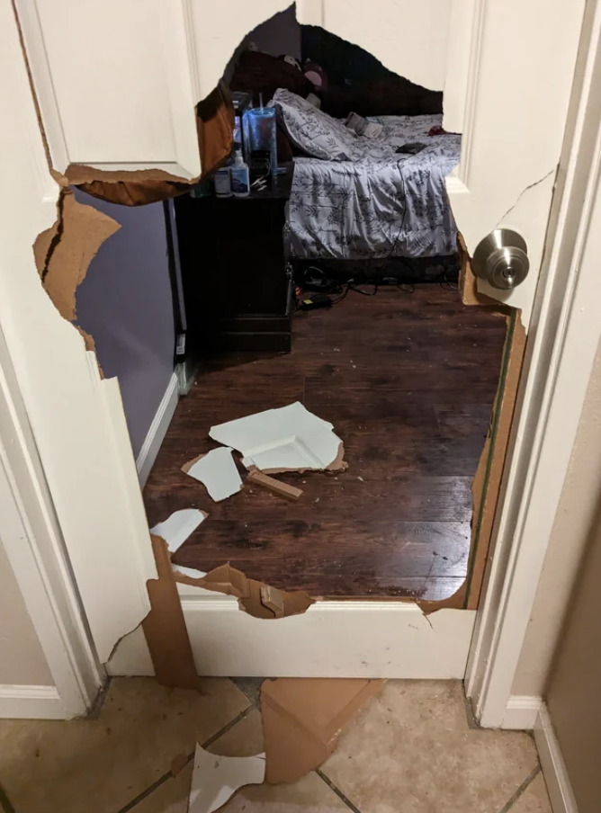 A destroyed bedroom door