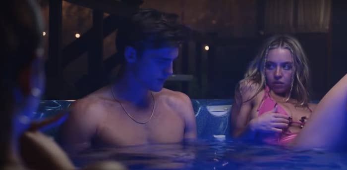 her character in a hot tub with others