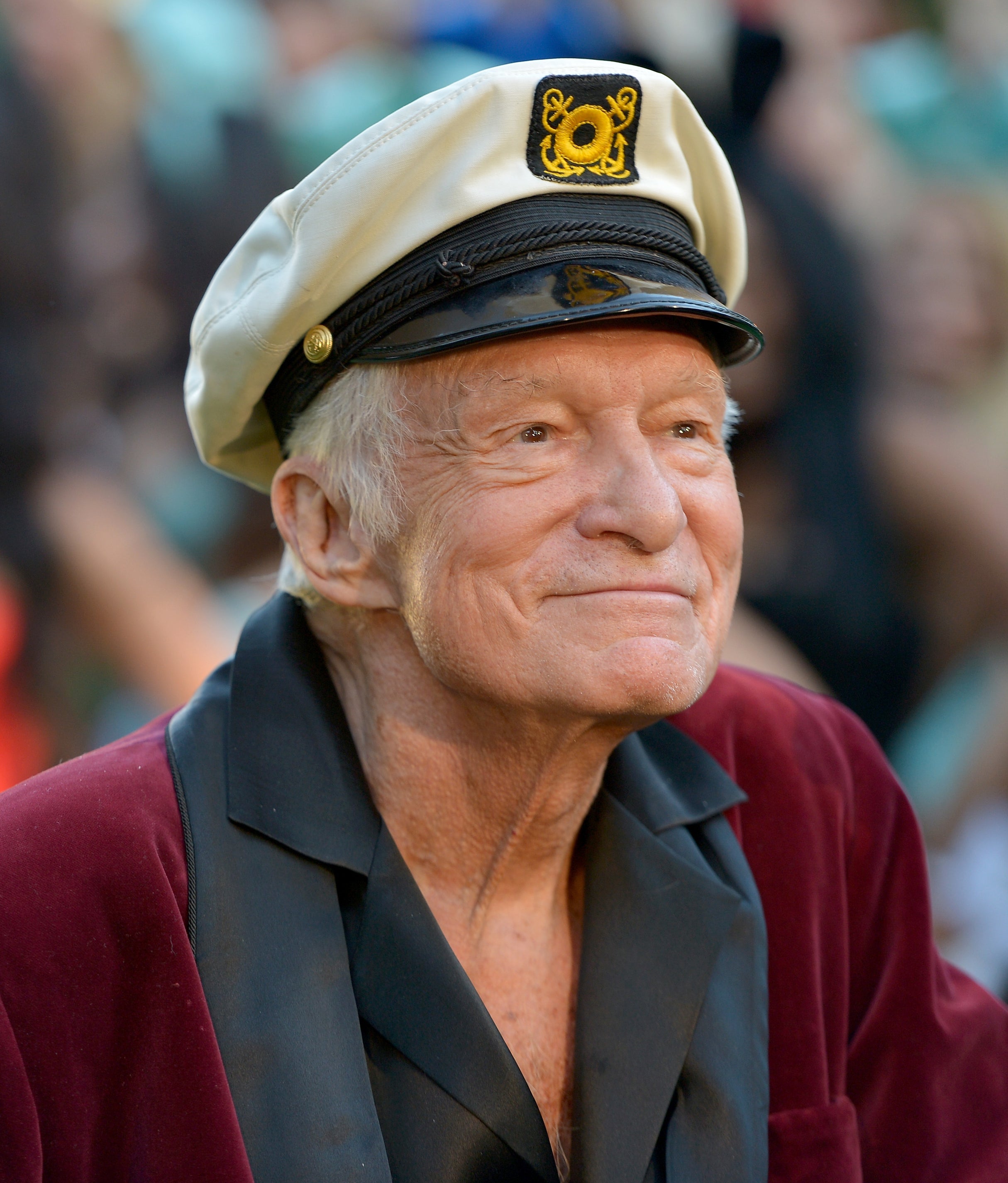 Close-up of Hugh wearing a cap