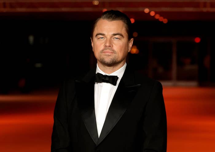 A close-up of Leo in a tuxedo on the red carpet
