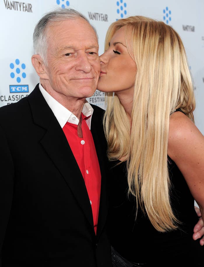Crystal kissing Hugh&#x27;s cheek at a media event