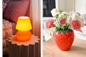 left: an orange lamp; right: strawberry-shaped vase with flowers inside