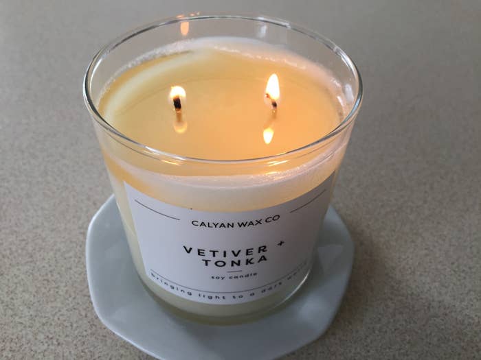a reviewer photo of the vetiver and tonka candle