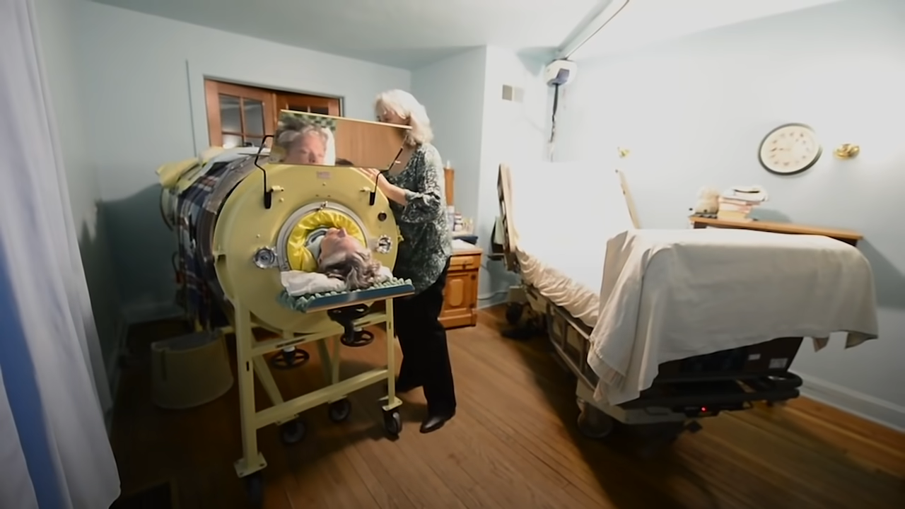 A woman in an iron lung