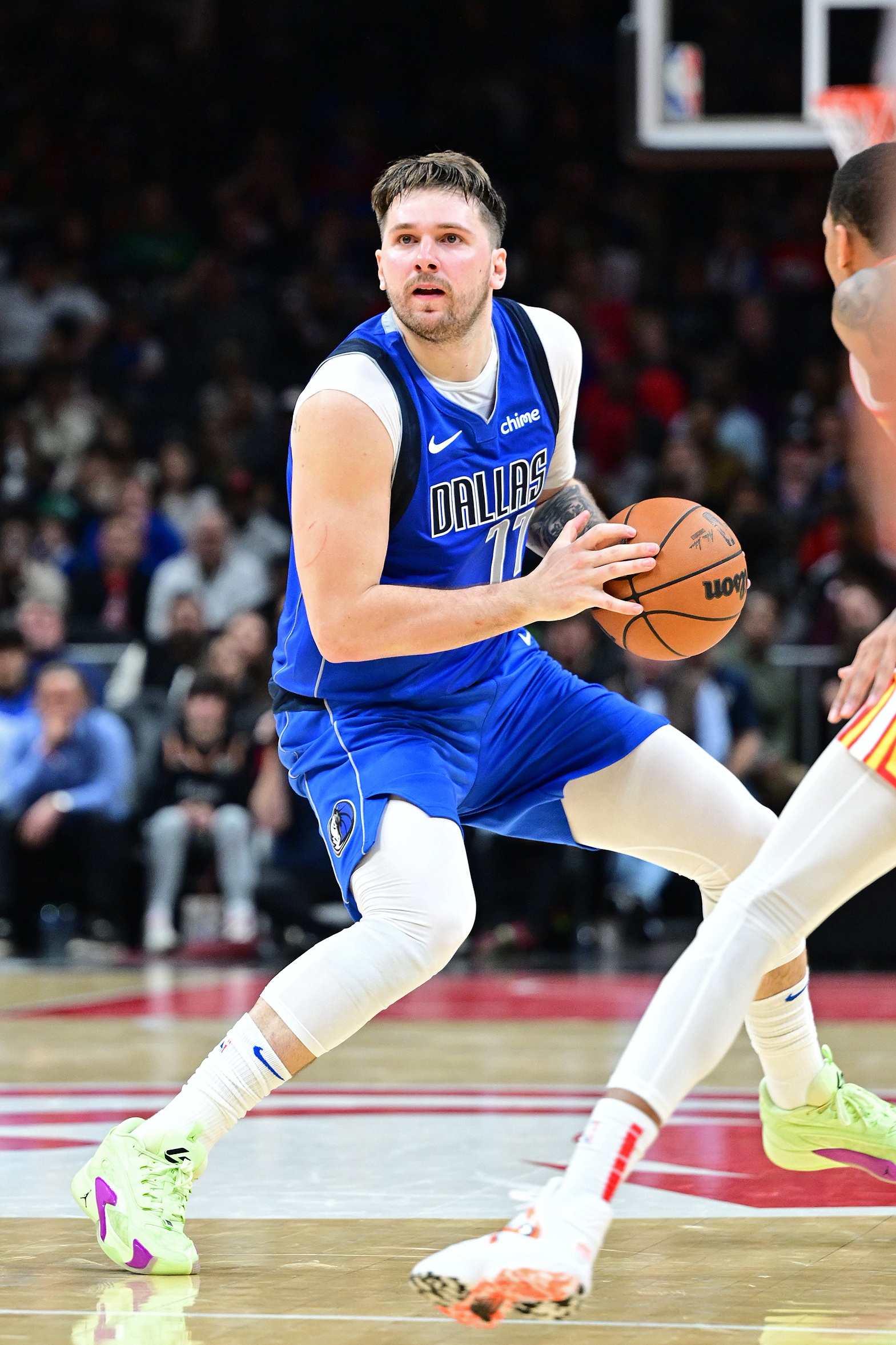 Luka Doncic #77 of the Dallas Mavericks handles the ball during the game against the Atlanta Hawks on January 26, 2024 at State Farm Arena in Atlanta, Georgia.