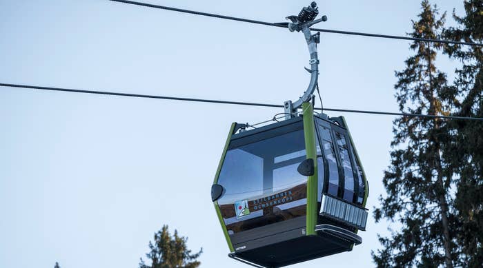 A ski gondola suspended in the sky