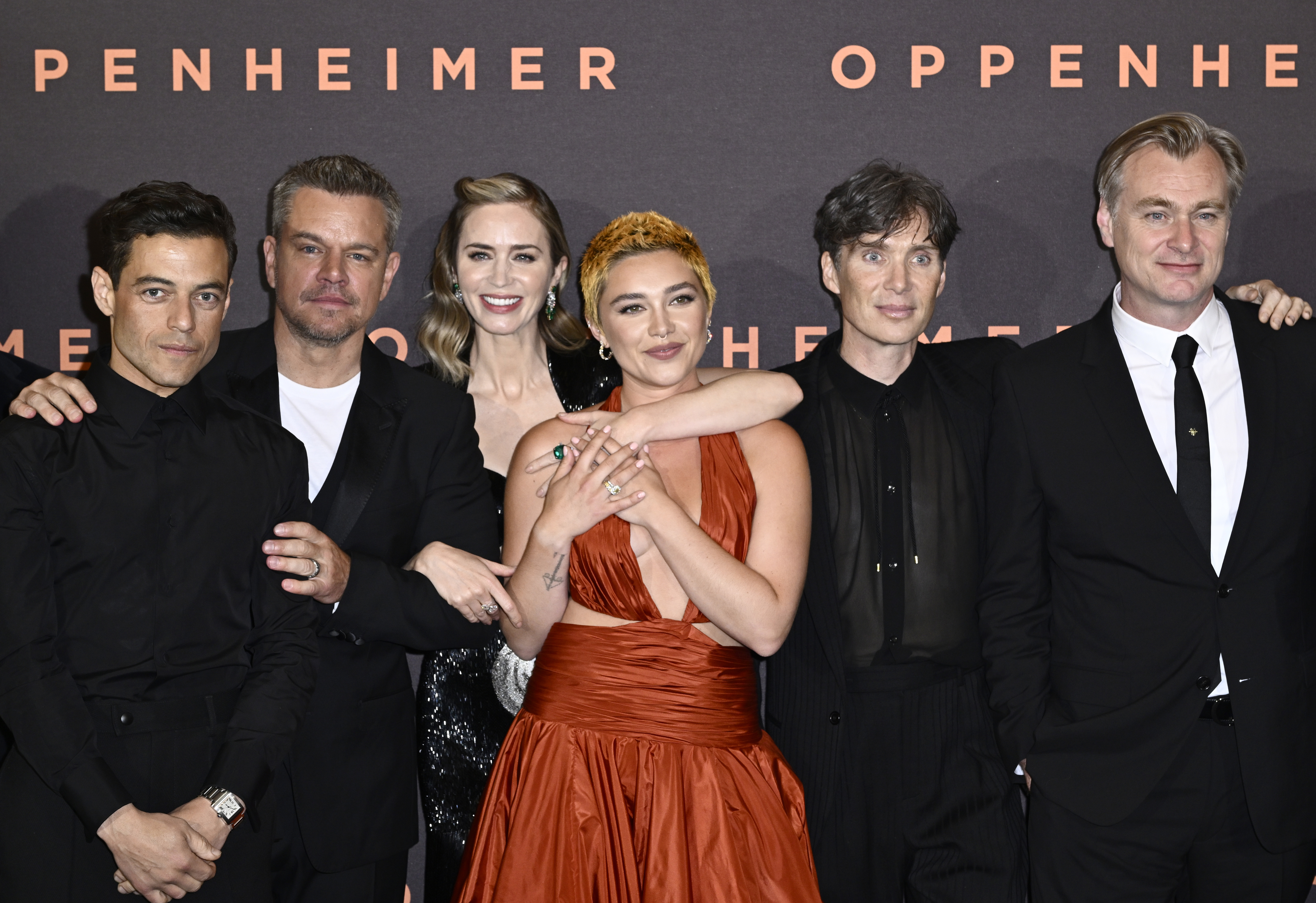 Close-up of Oppenheimer cast members with Christopher at a media event