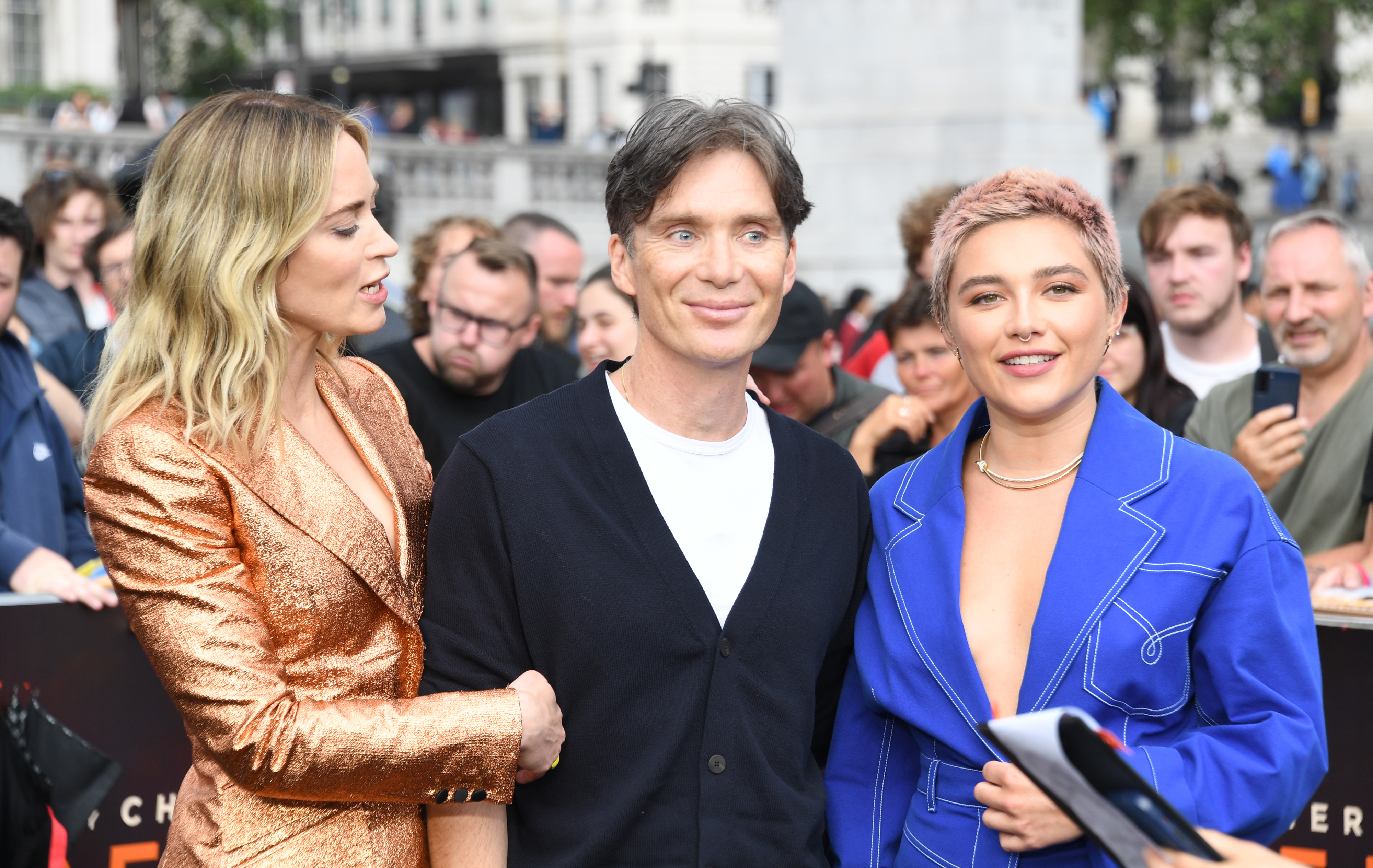Close-up of Florence, Emily, and Cillian at a media event