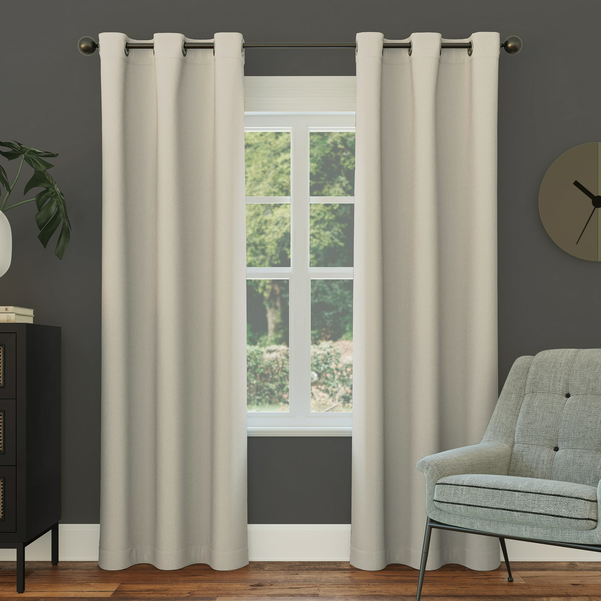 the curtain panels in the color Silver