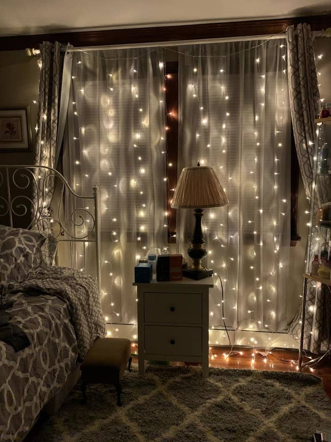 fairy lights in front of a window
