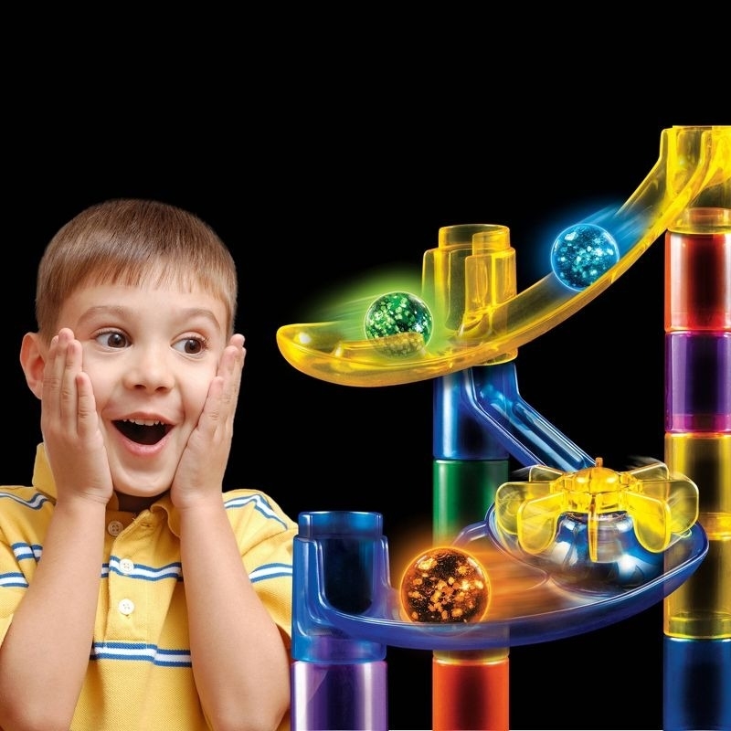 A child watched a marble run