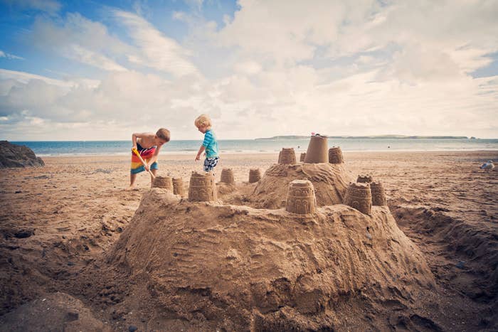 Kids building a sand castle