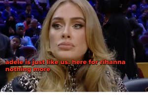 Adele watches a basketball game with her lips puckered