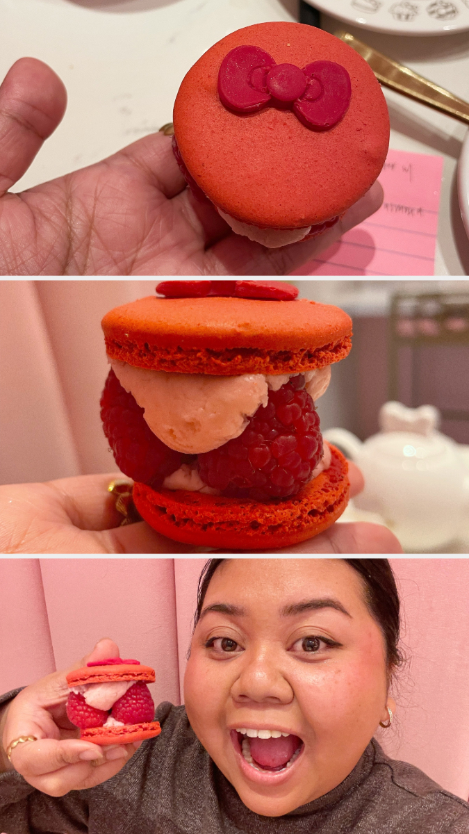 The author is holding up the raspberry macaron