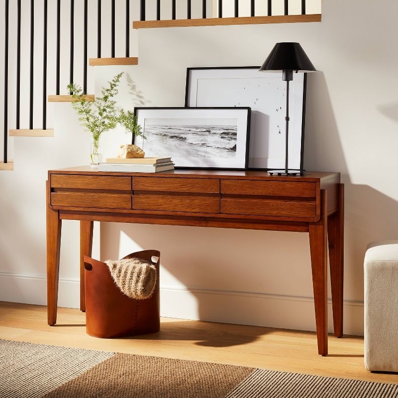 The console table in a room with decor