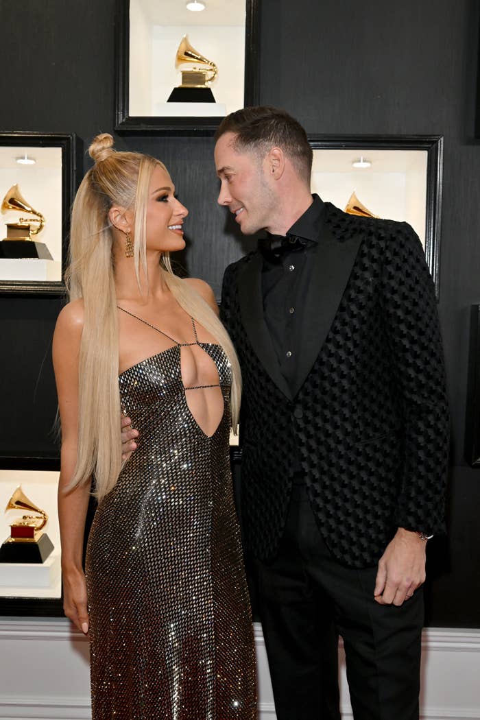 The couple look at each other on the Grammy red carpet