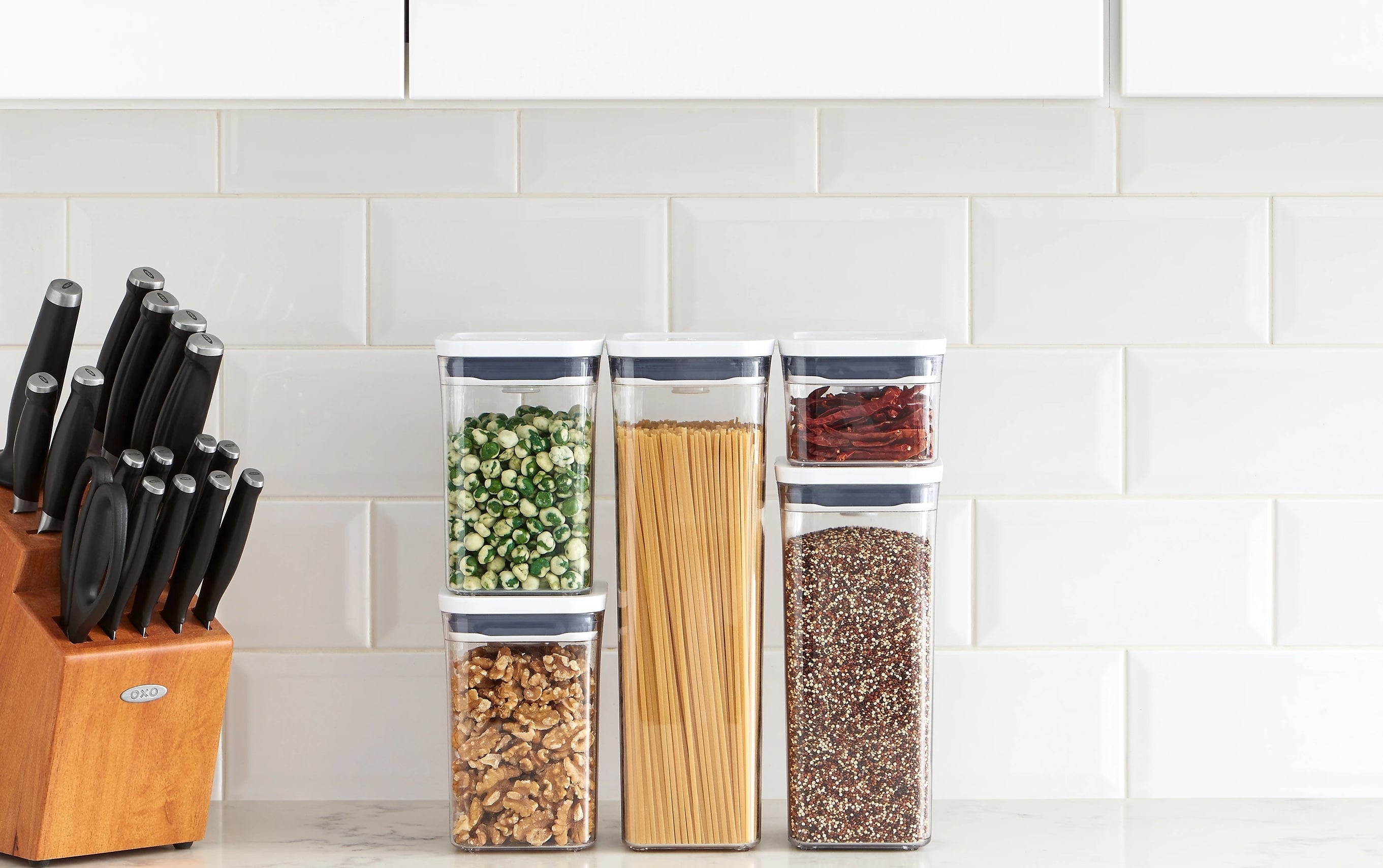 stackable canisters with dry foods inside