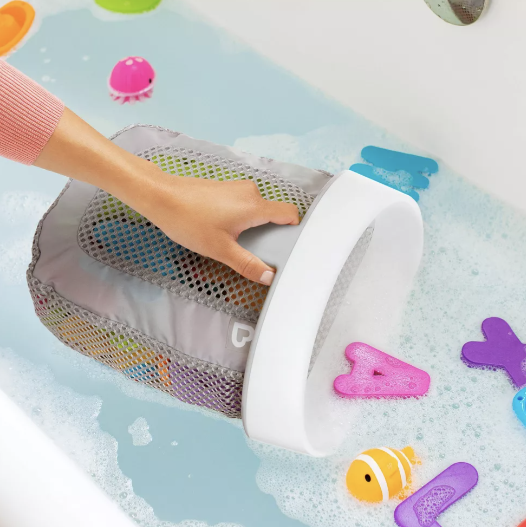 the gray netted bathtub organizer with felt water toys in tub