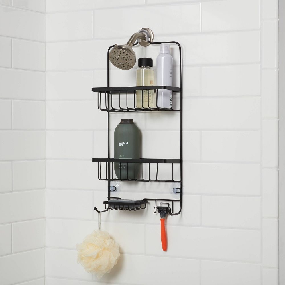 the shower caddy hanging up in a shower