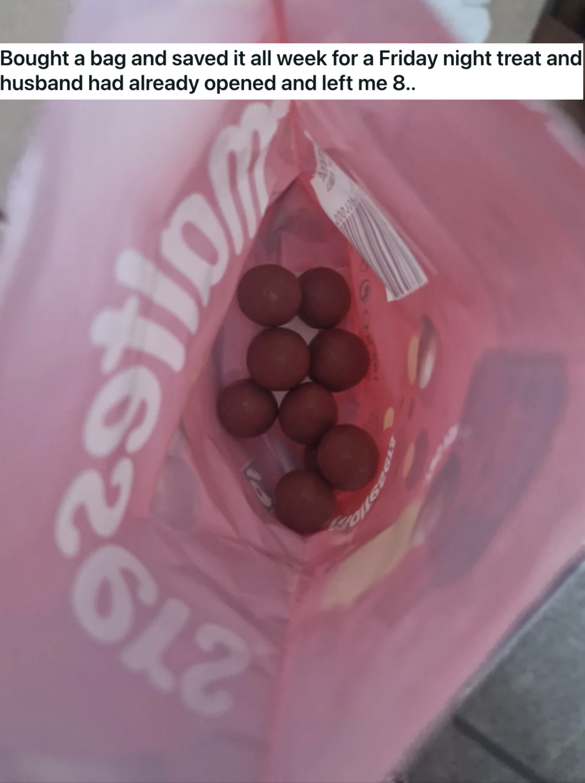 An almost-finished bag of Maltesers