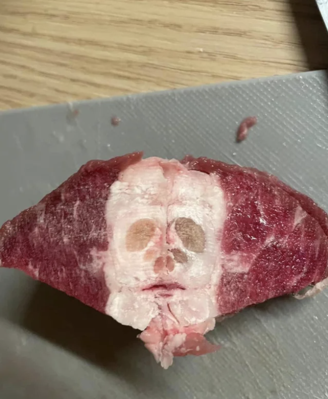 A face on a cut of meat