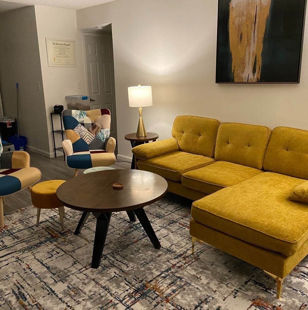 a reviewer photo of the mustard yellow sofa