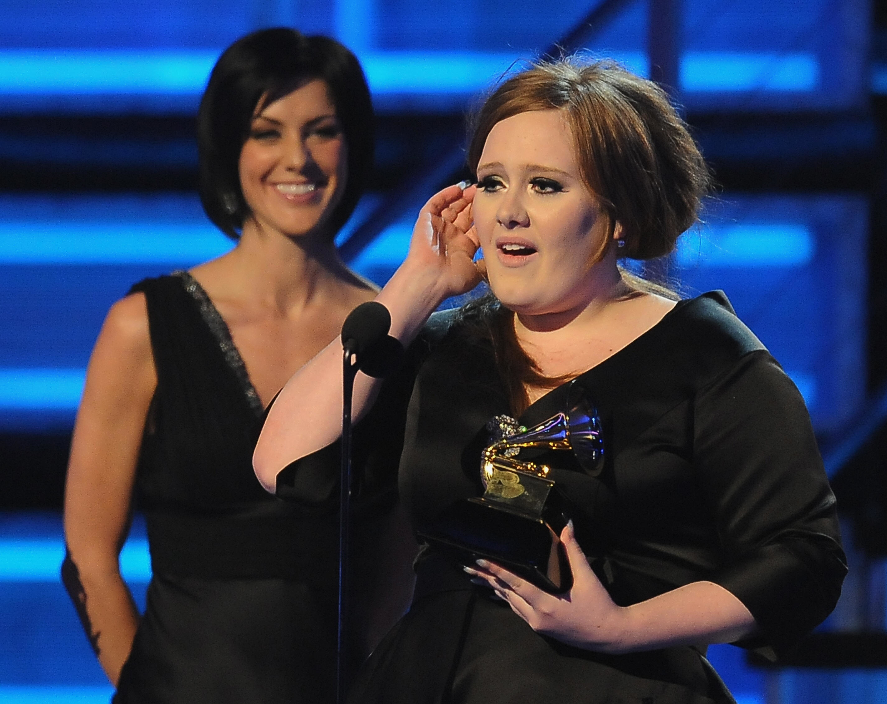 Adele accepting her Grammy