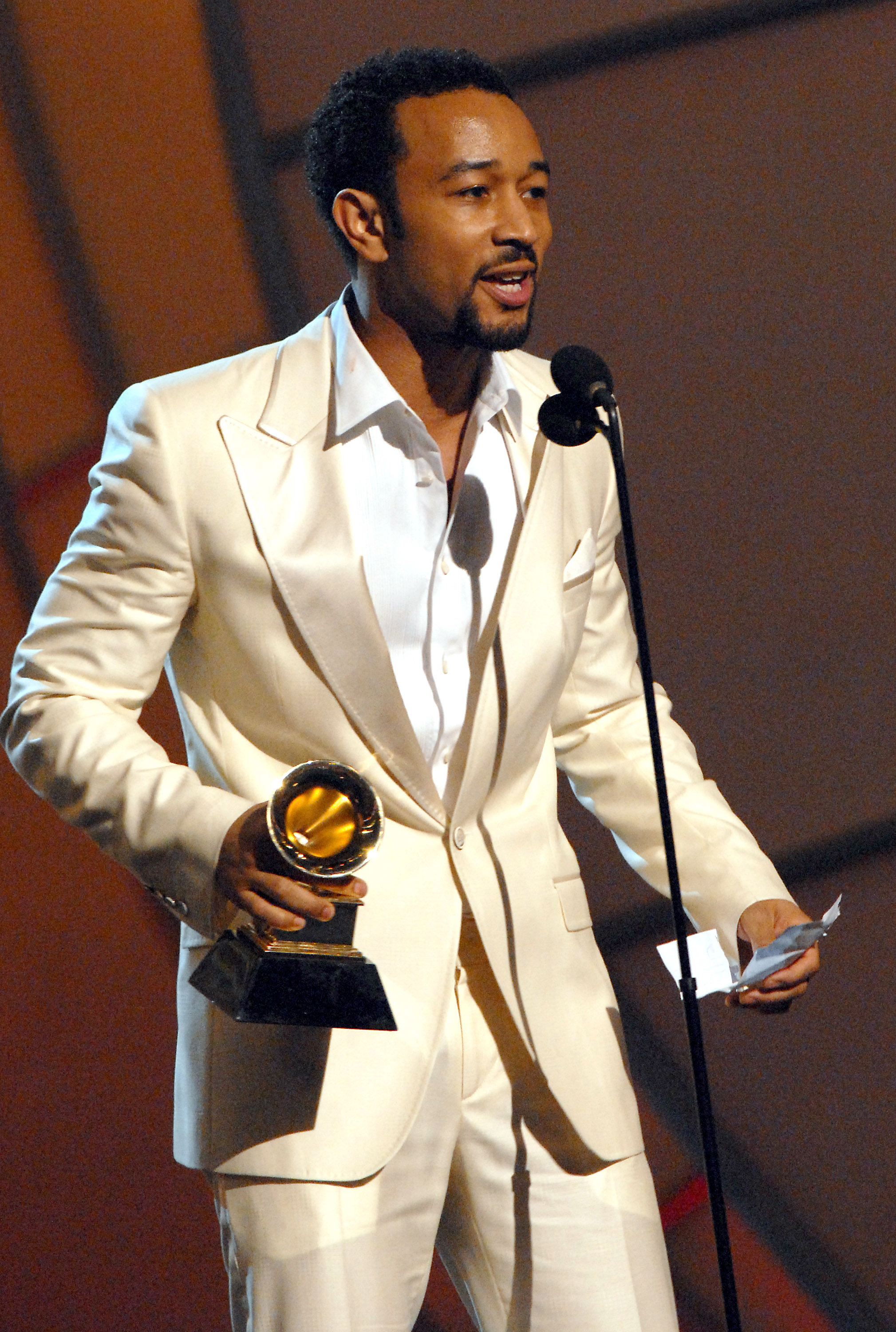 John Legend accepting his Grammy