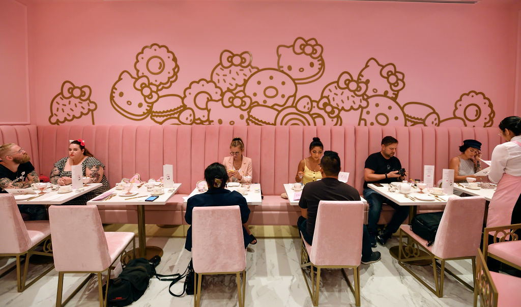 People are enjoying their time at the Hello Kitty Cafe