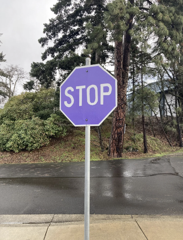 A purple stop sign