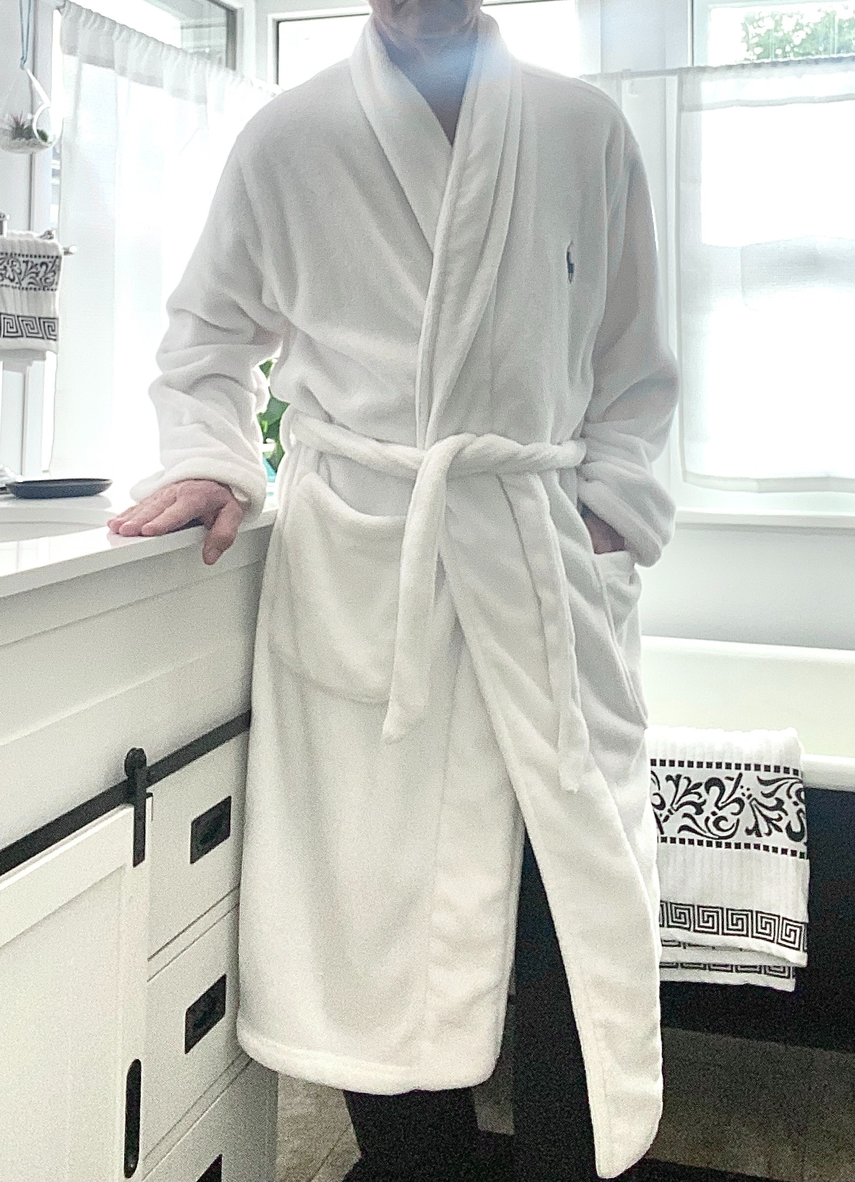 a reviewer wearing the white robe