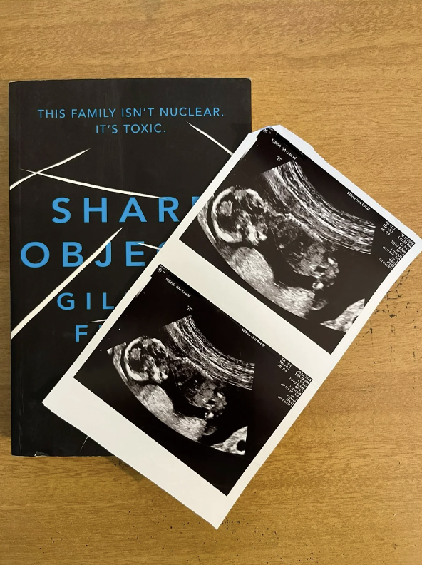 A sonogram on top of a book