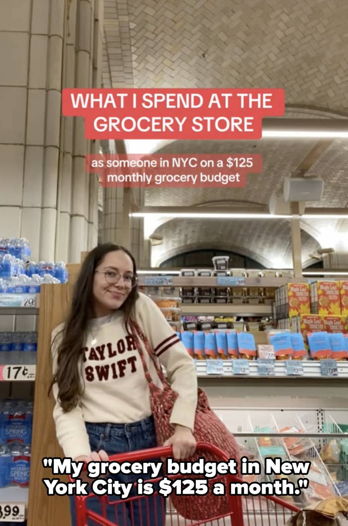 Maria holding a shopping cart in a Trader Joe&#x27;s grocery aisle with quote, &quot;My grocery budget in New York City is $125 a month&quot;