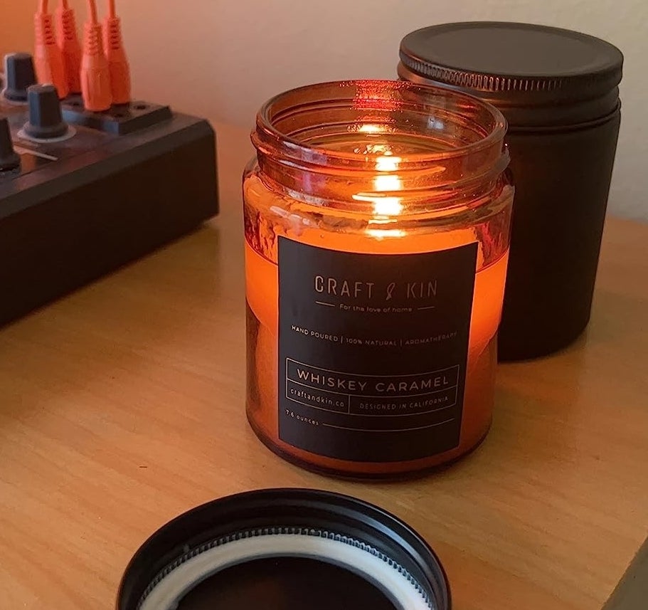 a reviewer photo of the whiskey caramel candle