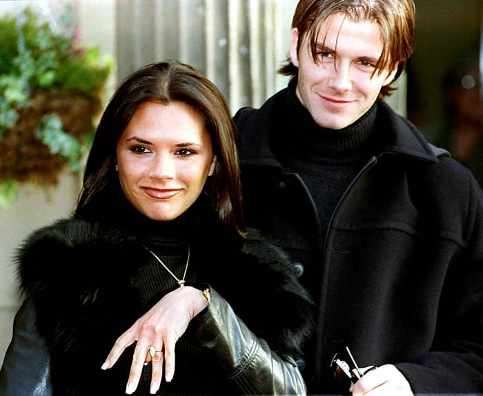 Victoria showing off her engagement ring with David Beckham