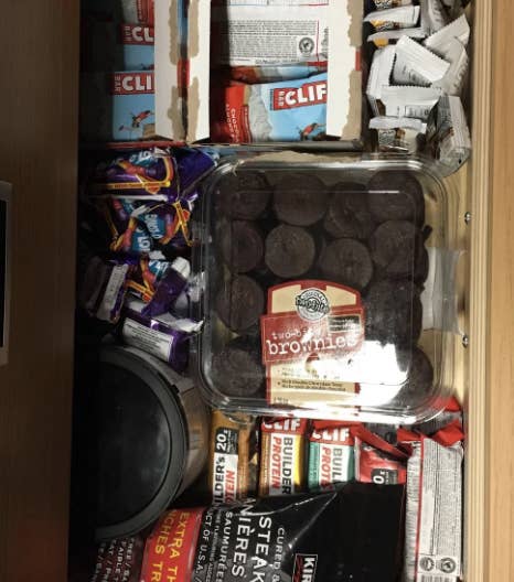 Many snacks in a crammed closet