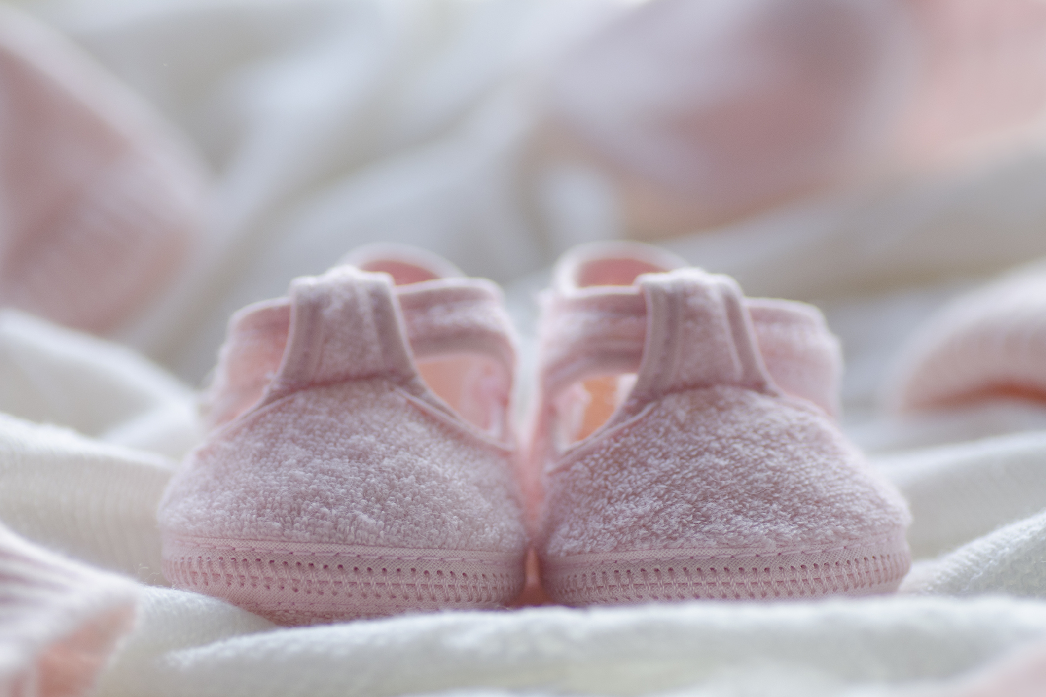 Tiny pink baby shoes