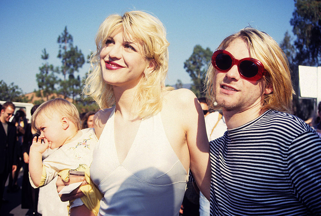 Courtney Love and Kurt Cobain with their daughter Frances Bean