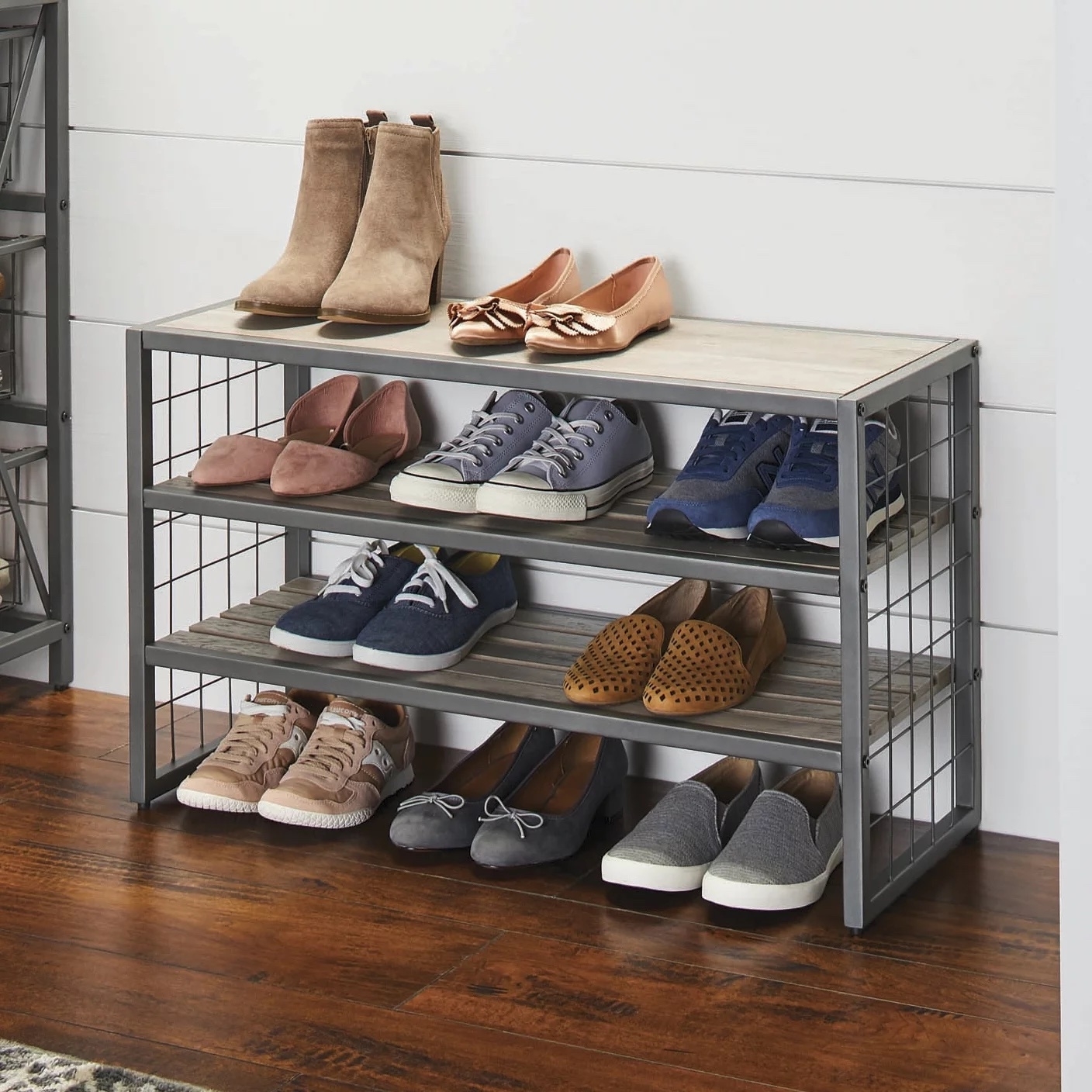 rack in hall with various shoes