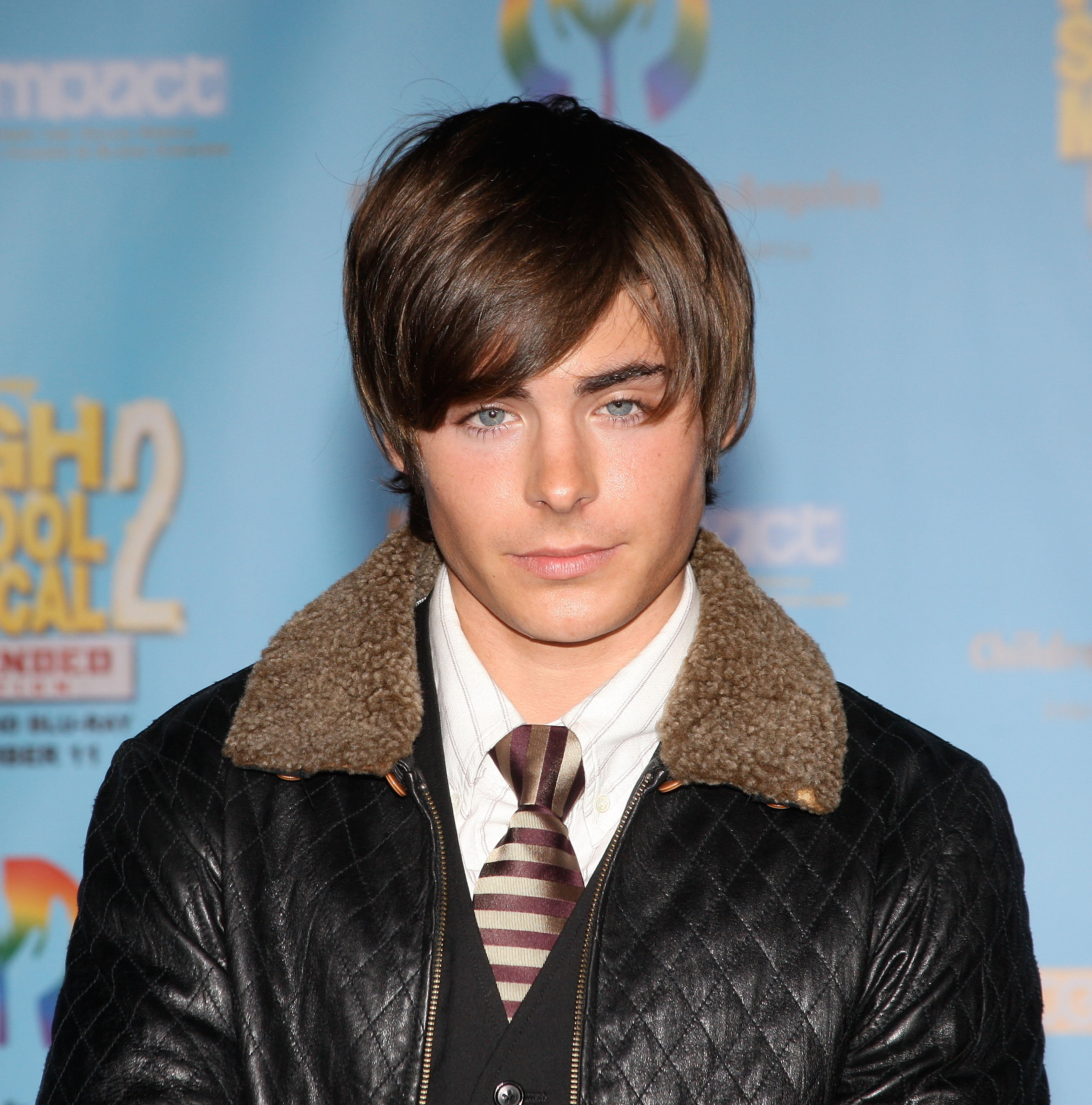 Close-up of a younger Zac at a media event